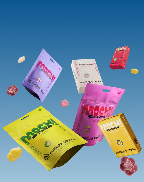 Sundae Flowers mochi tin and refill packs floating in the sky.