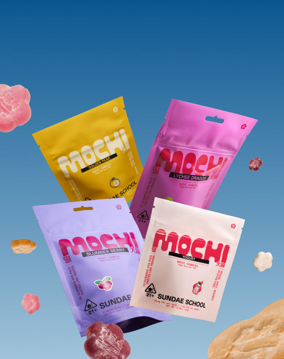 A vertical mobile banner featuring four Sundae School Mochi gummy pouches—Golden Pear, Lychee Dragon, Slumber Berry, and Yogurt—floating against a vibrant blue gradient background. Small flower-shaped gummies in various pastel colors drift through the air around the packaging.