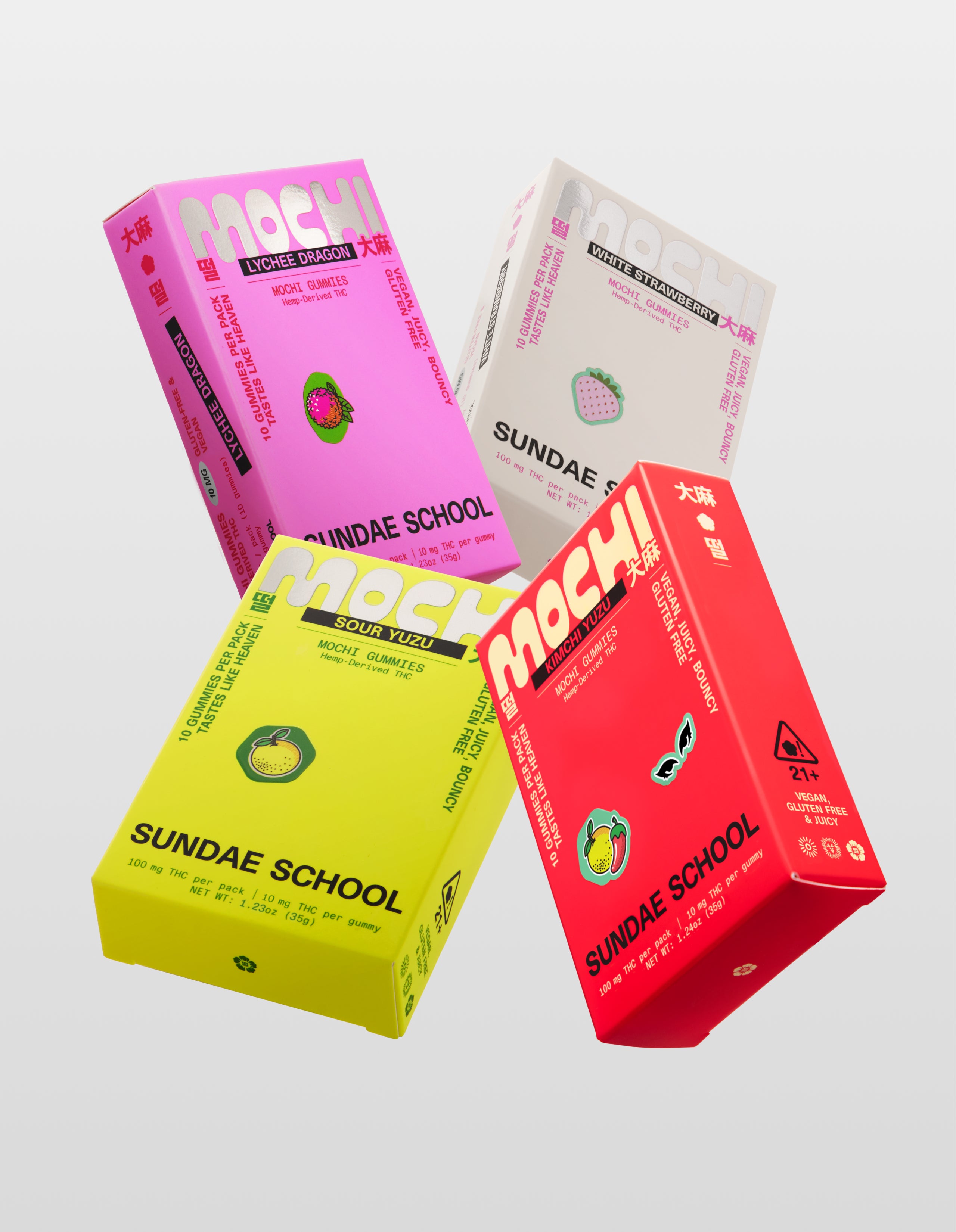 Four colorful boxes (Lychee Dragon, White Strawberry, Kimchi Yuzu and Yuzu) of 'Sundae School Mochi Gummies' on a white background