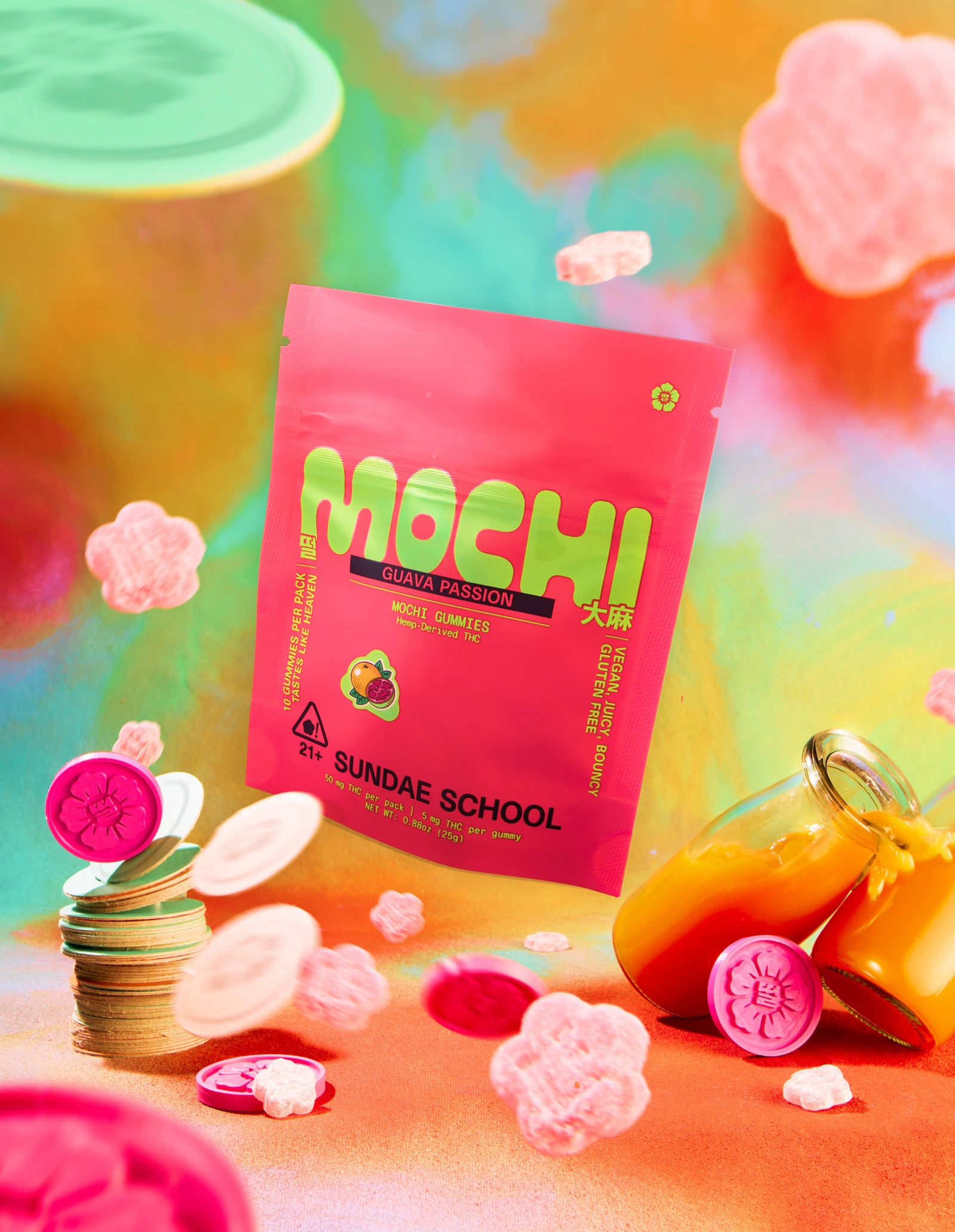 A dynamic, surreal product shot featuring a hot pink Sundae School Guava Passion pouch floating in the center. Tiny pink gummies float through a dreamy, colorful background, while a stack of tokens and two small glass bottles spilling orange passion fruit liquid sit on the surface below.