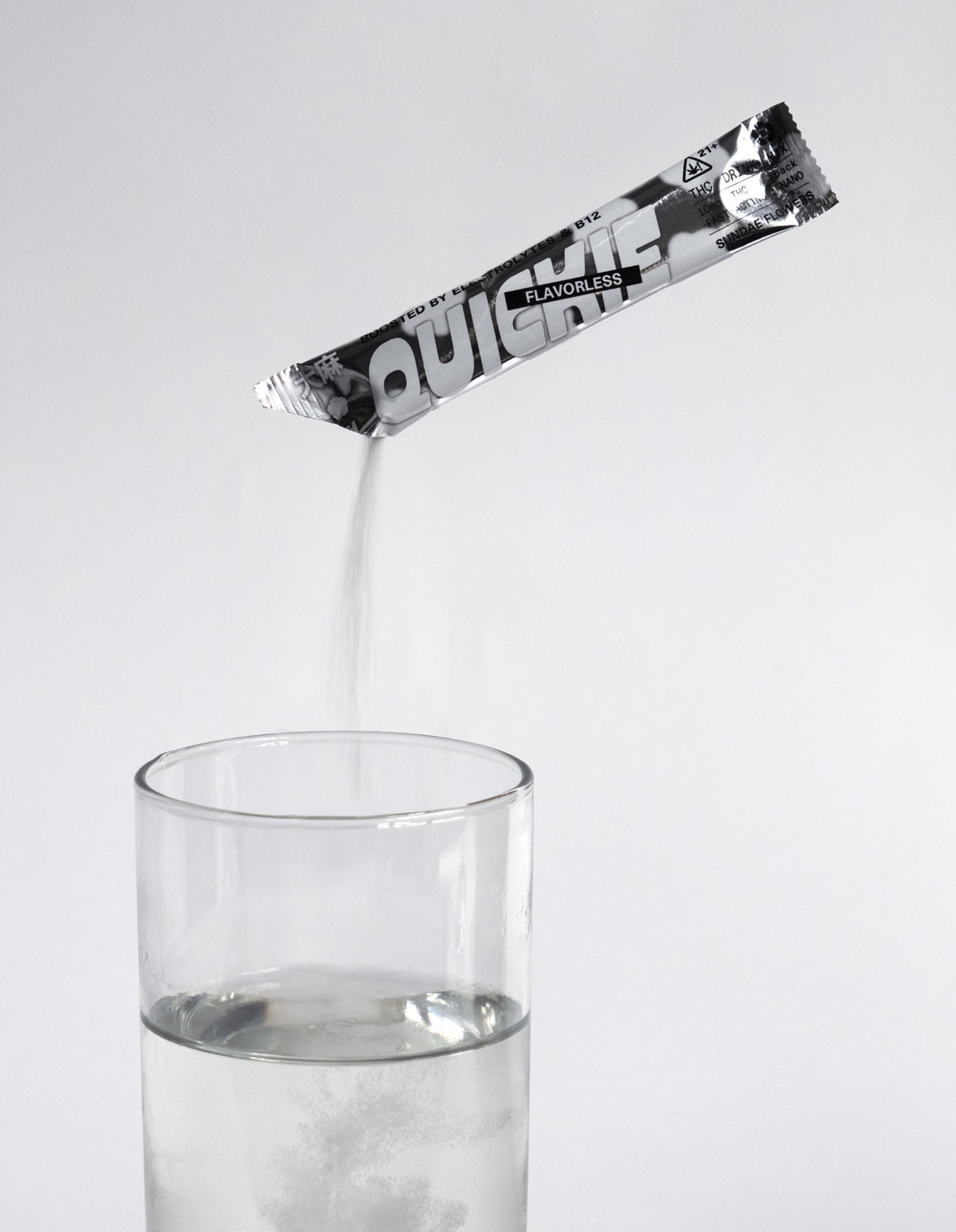 Flavorless quickie being poured into a glass of water.