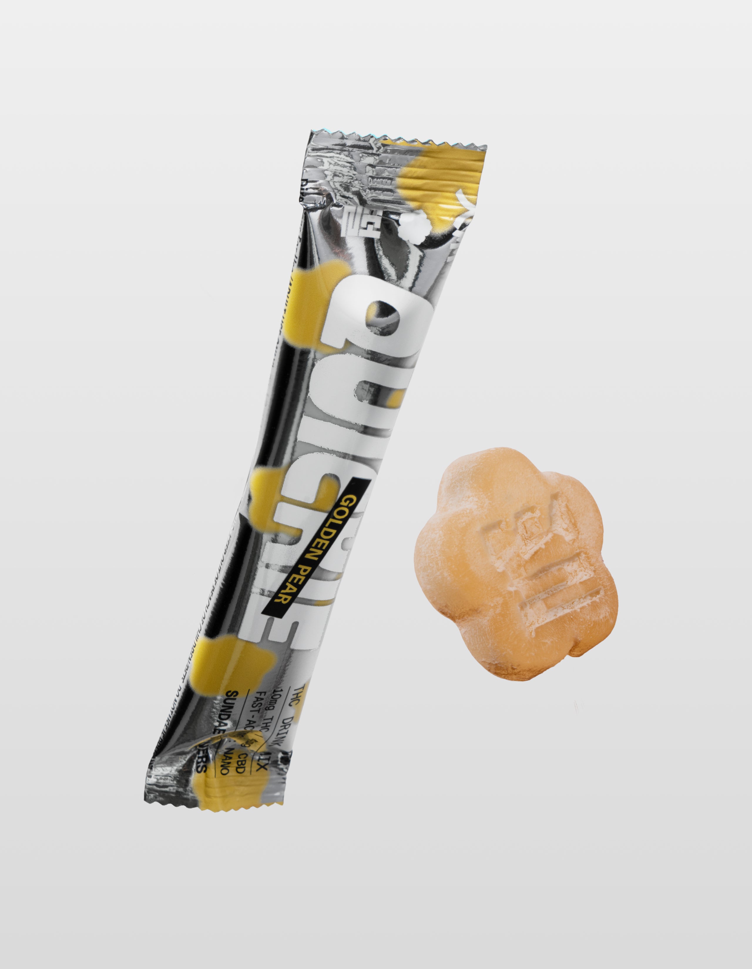 One Sundae School Golden Pear Quickie stick placed next to a golden pear mochi on a white background.