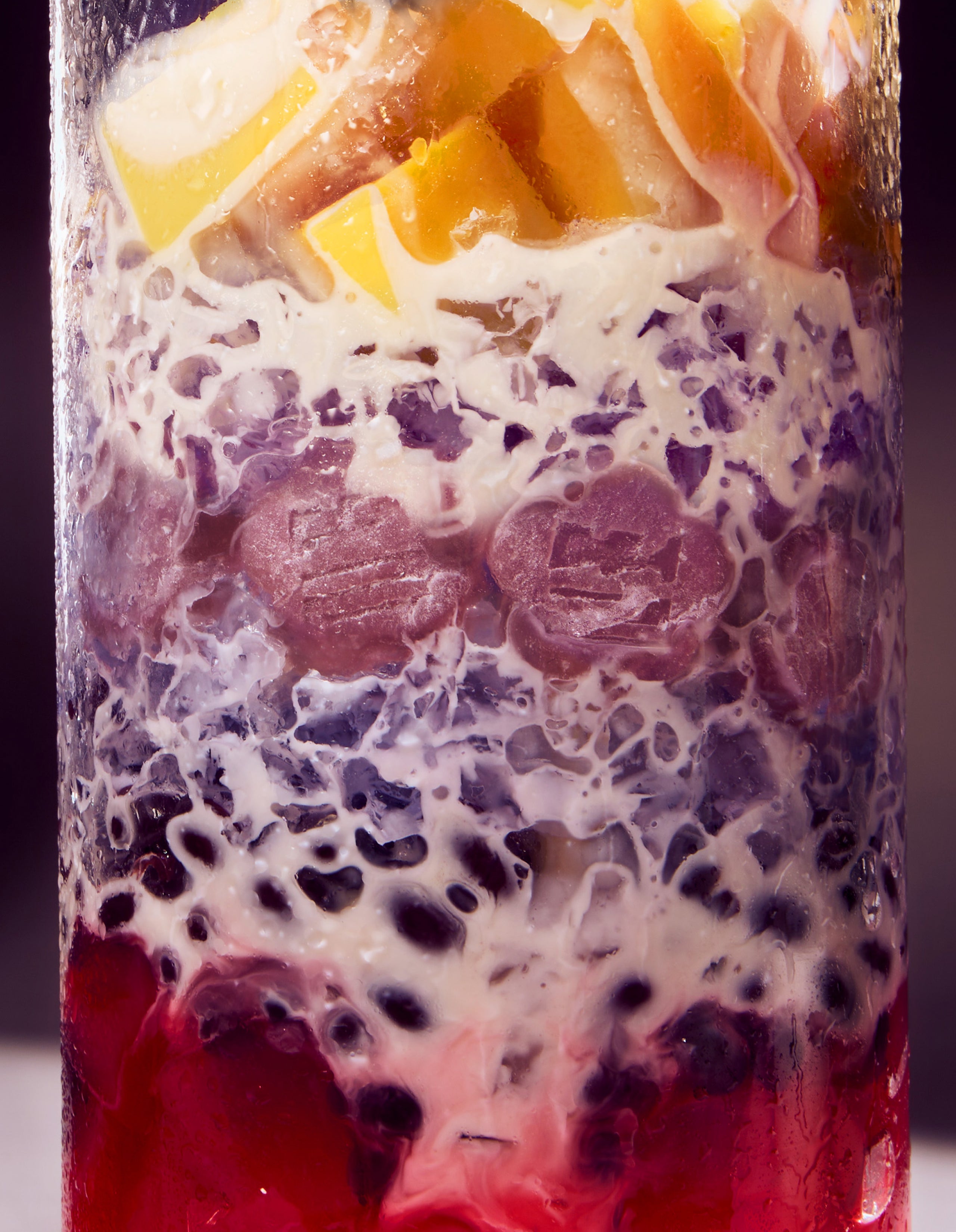 Sundae School Ube Mochi gummies layered in Filipino dessert Halo Halo along with other layers including fruit  jelly, mango, shaved ice, and condensed milk.